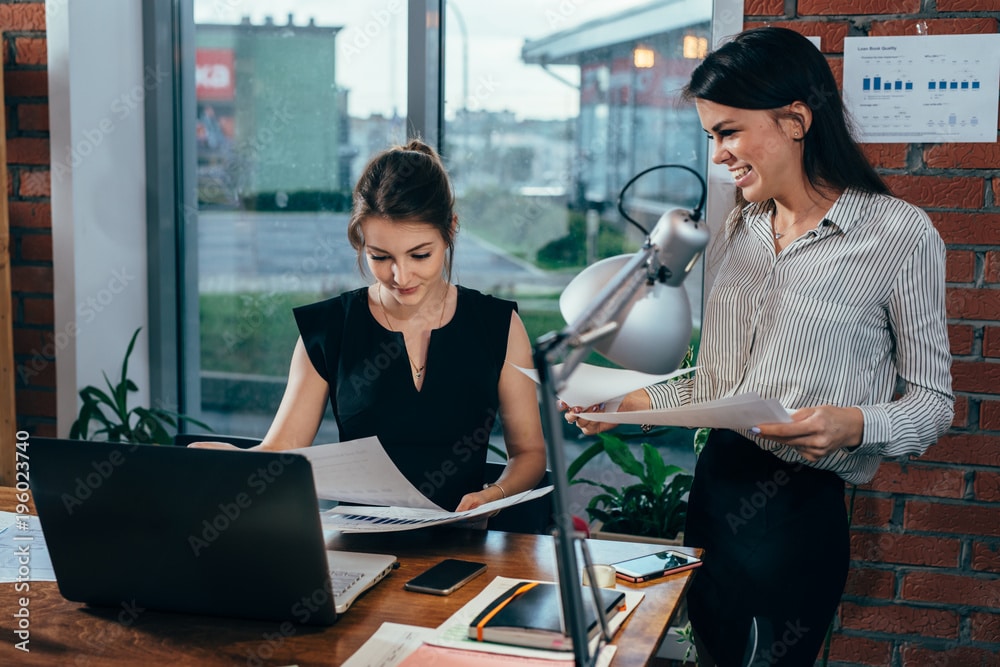 An HR executive assistant speaking with the manager.