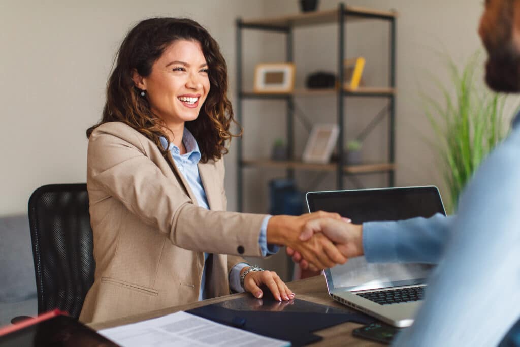 An executive assistant discovered through C-Suite Assistants, interviewing with executives.