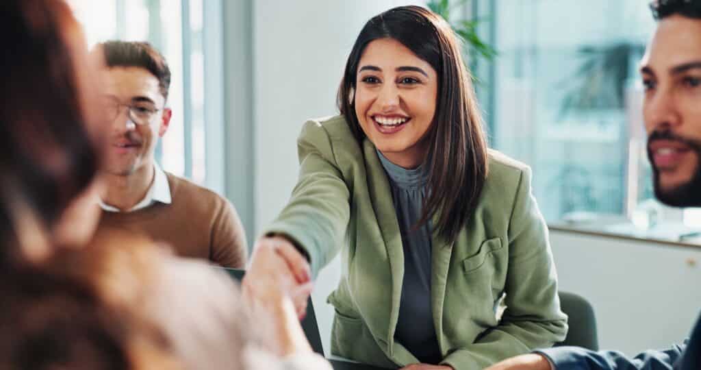 Executive and assistant matched by an executive assistant recruitment agency reviewing priorities together